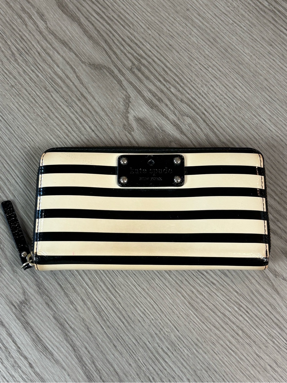 kate spade Black and Cream Striped Patent Wallet with Logo Plaque